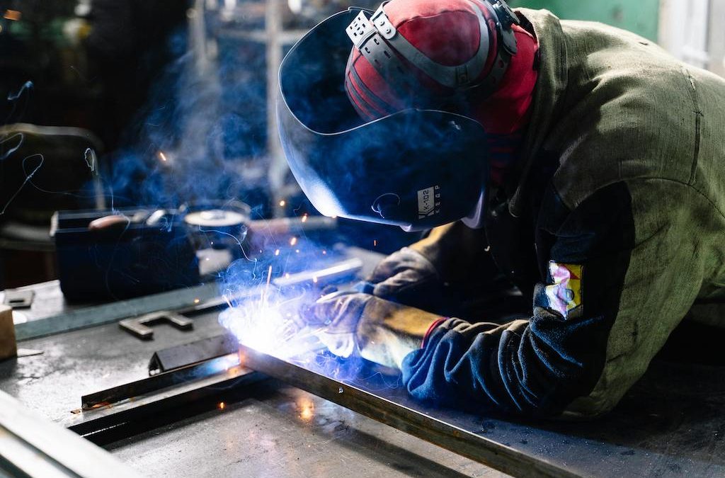 https://www.pexels.com/photo/man-welding-metal-bars-2381463/
