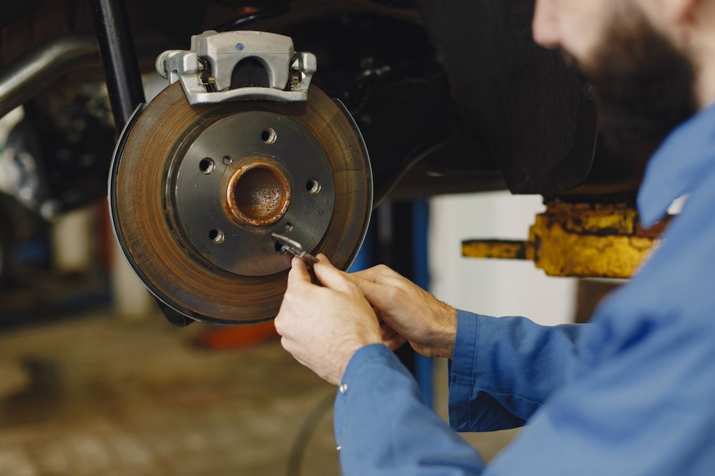 a person fixing a car